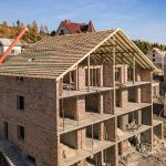 wooden-frame-new-roof-brick-big-house-construction-Top